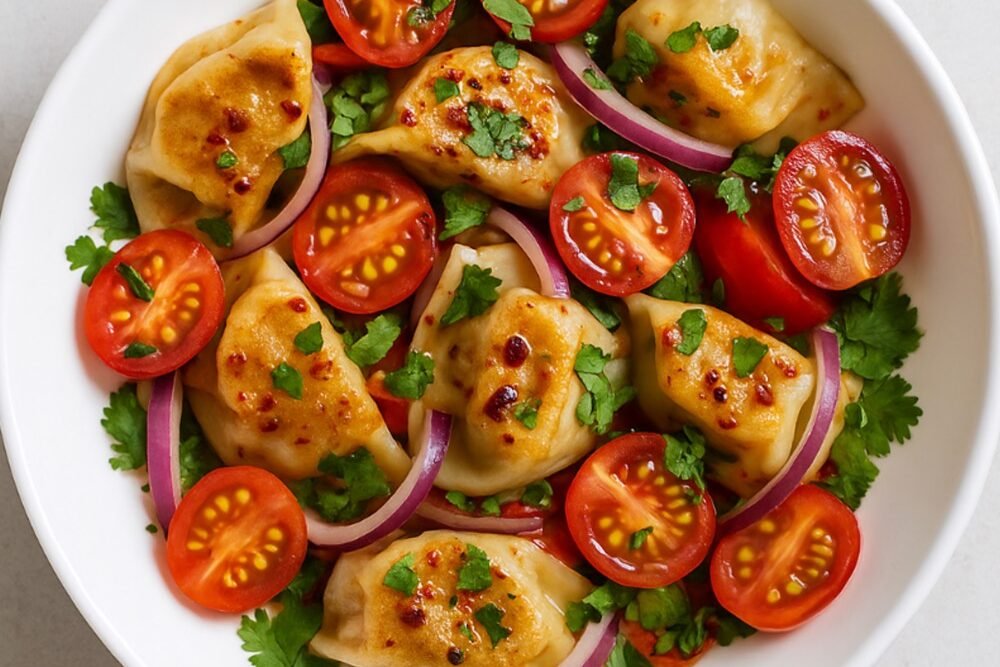 Dumpling Tomato Salad in a white bowl.
